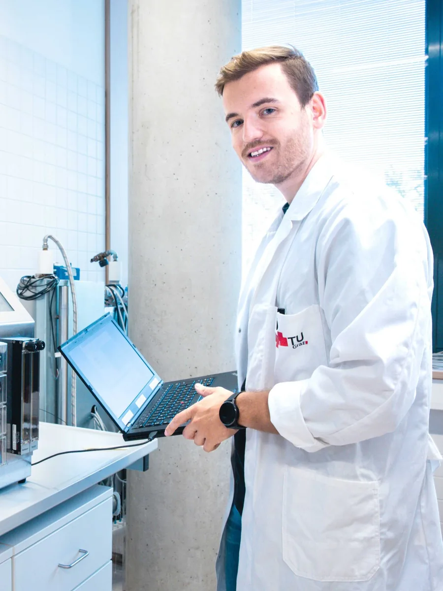SimVantage researcher evaluating simulation results in the laboratory